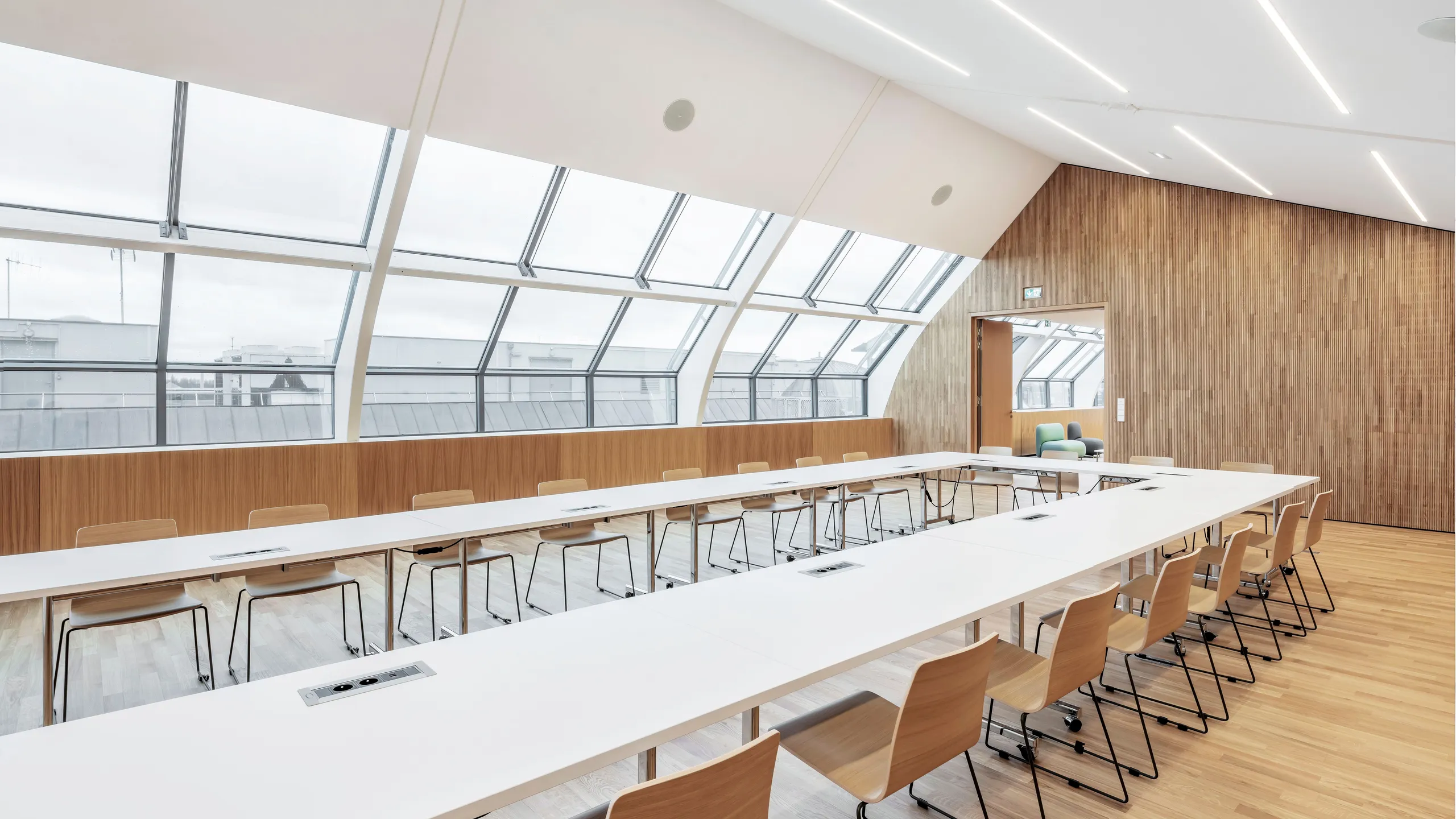 meeting room ceiling design and wooden flooring, light and modern and natural materials