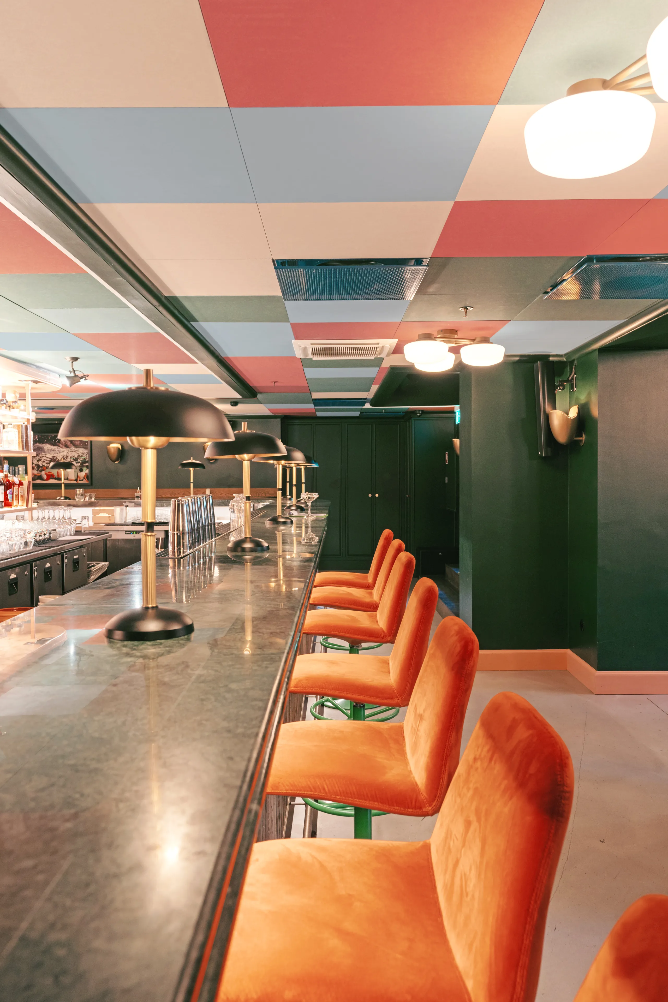 Hotel acoustics optimised with hotel acoustic design and hotel ceiling design.