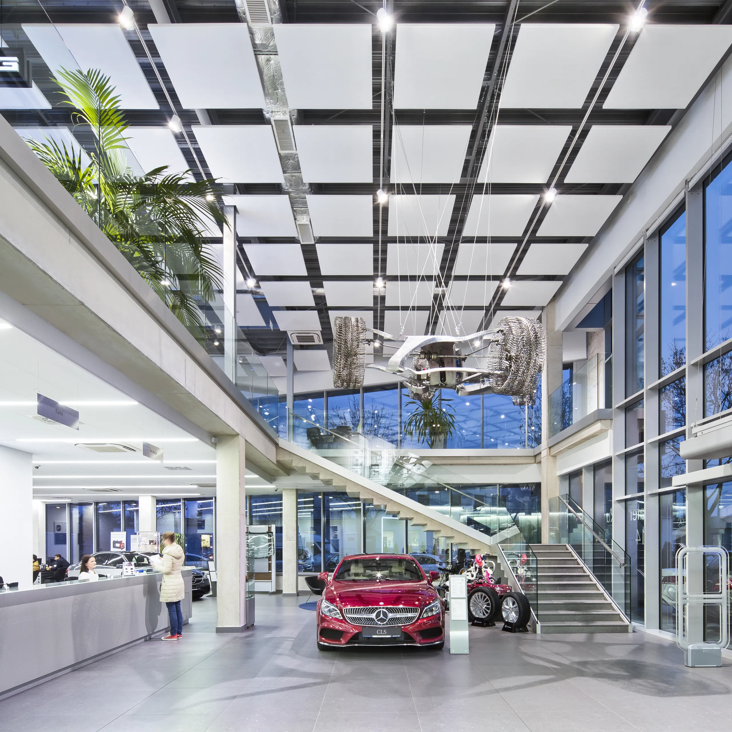 Detail view of Rockfon acoustic floating ceiling panels and suspending ceiling clouds or islands.