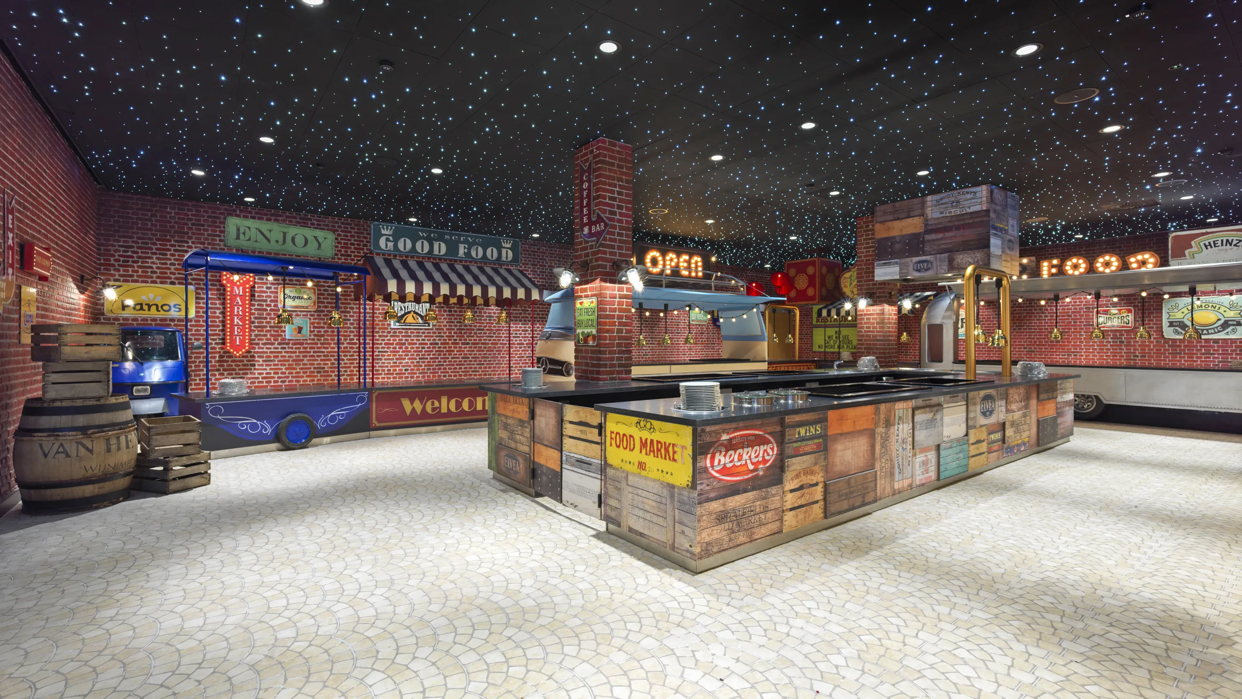 A colorful indoor market scene with black suspended ceiling and starry lighting, brick walls, vintage signs, and a starry ceiling, featuring a central counter and various food stalls.