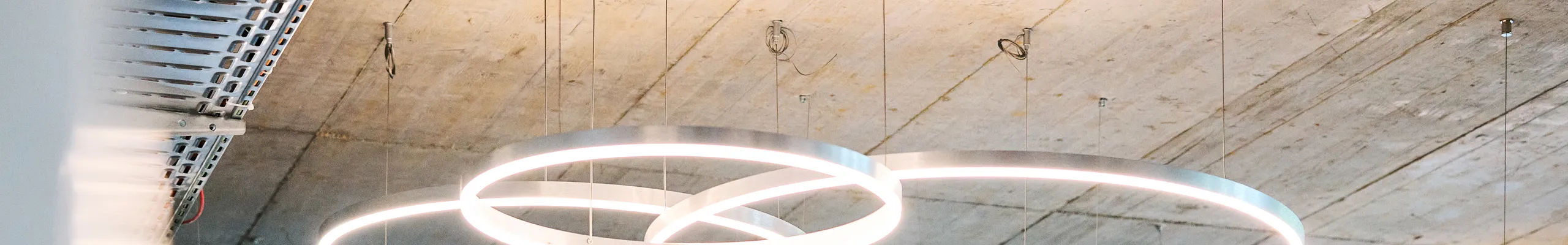 Detail view of Rockfon acoustic wall panels, floor screens, and hanging divider