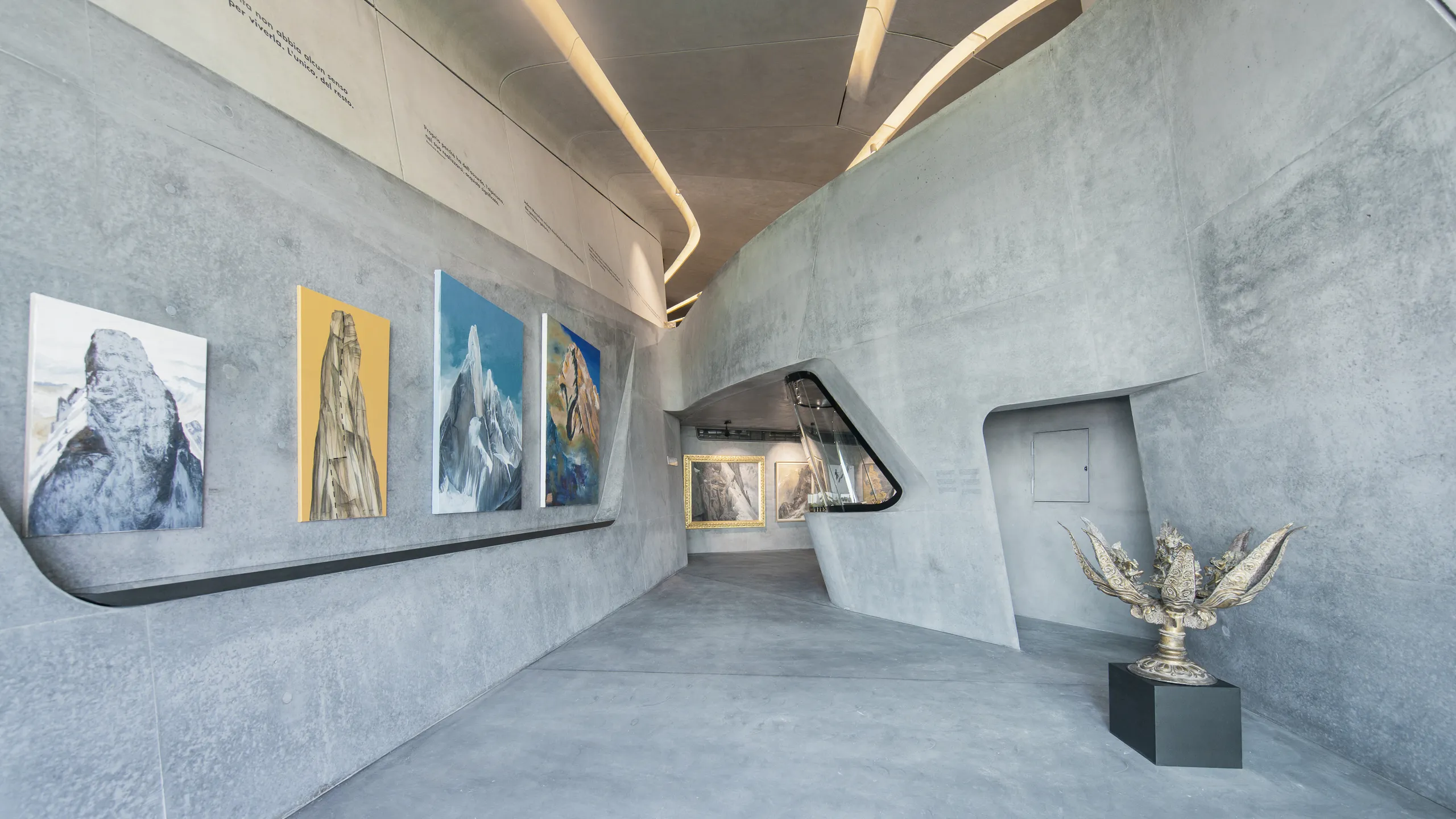 Monolithic grey ceiling design at a museum in Italy