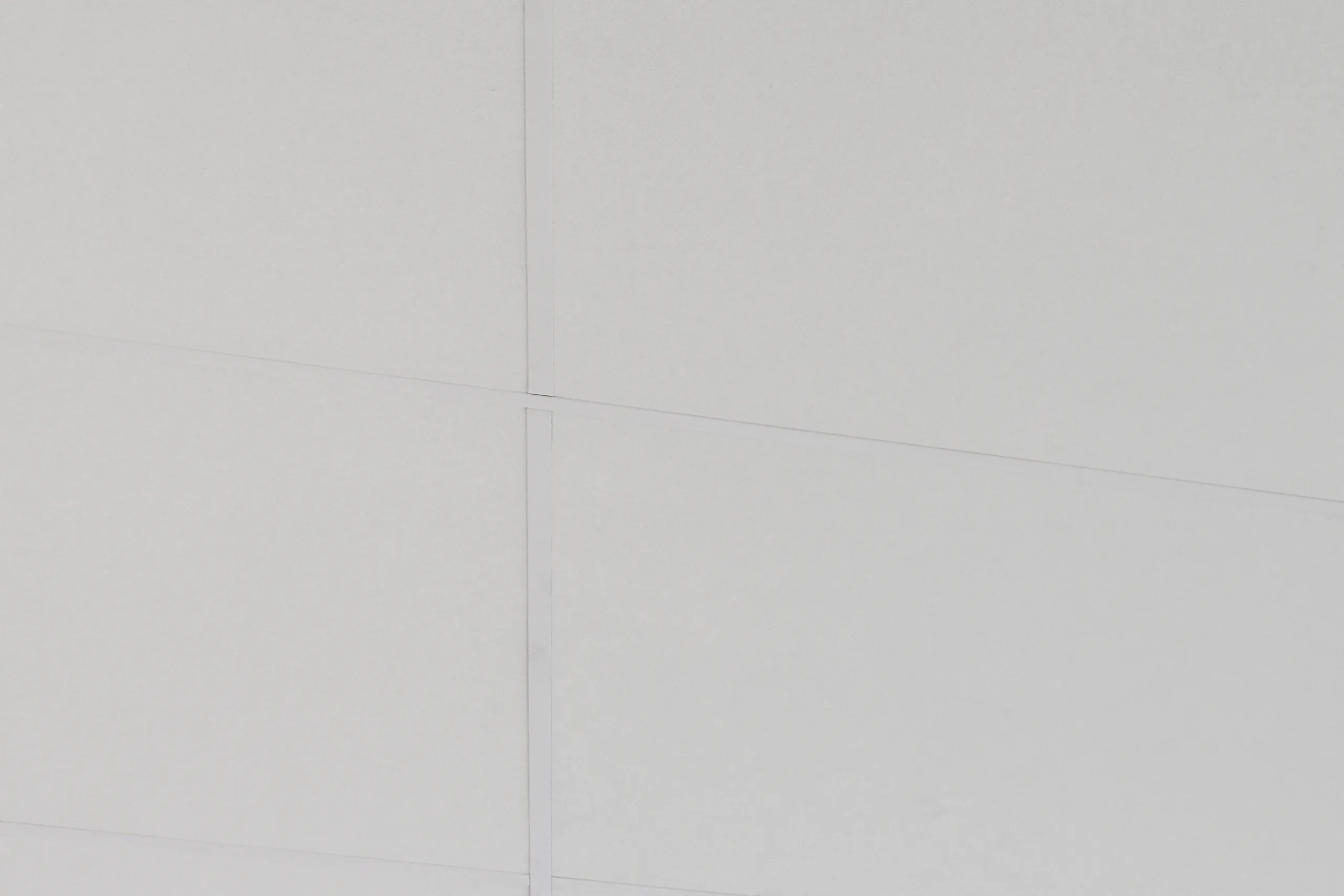 Close-up view of Rockfon acoustic ceiling tiles.