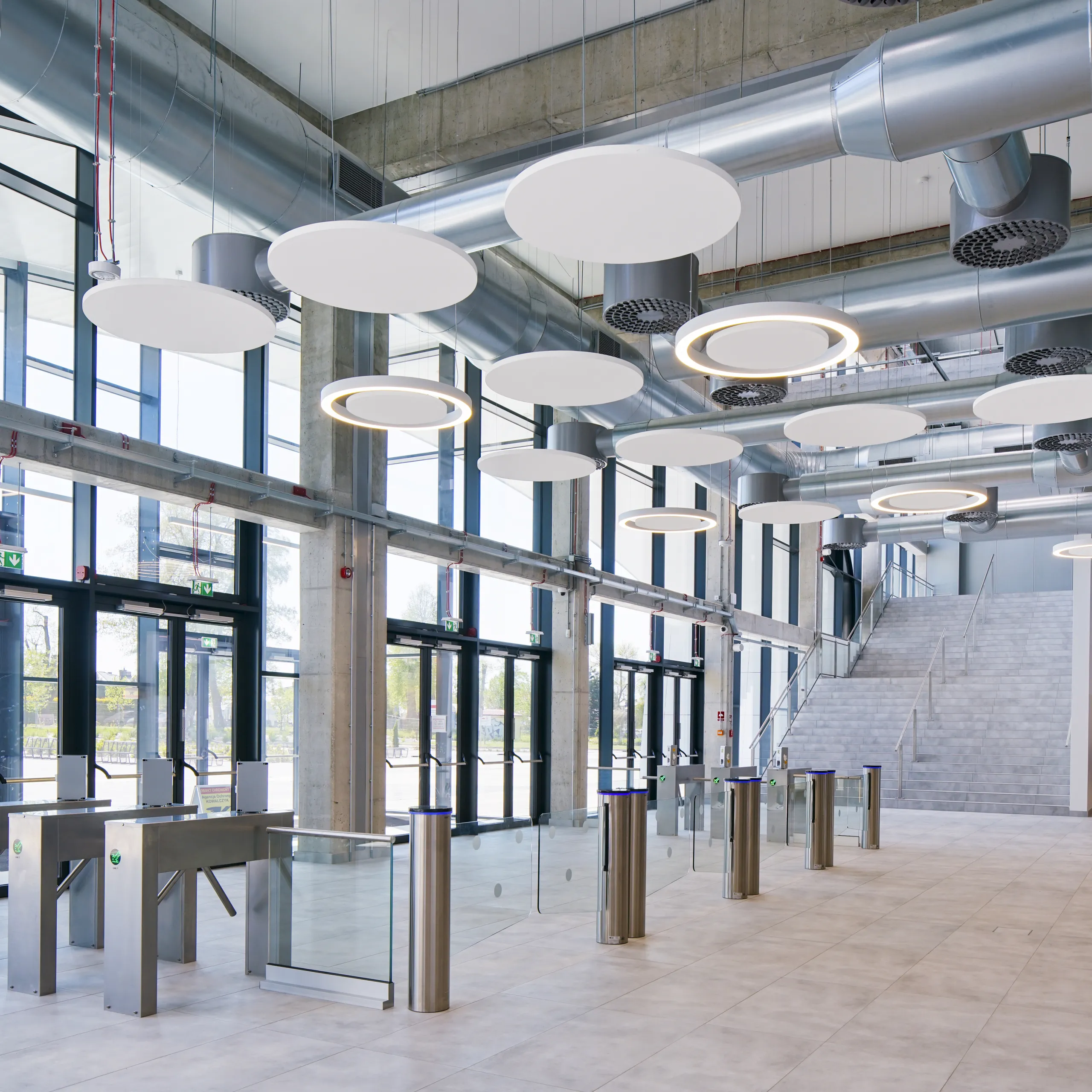 Detail view of Rockfon acoustic floating ceiling panels and suspending ceiling clouds or islands.