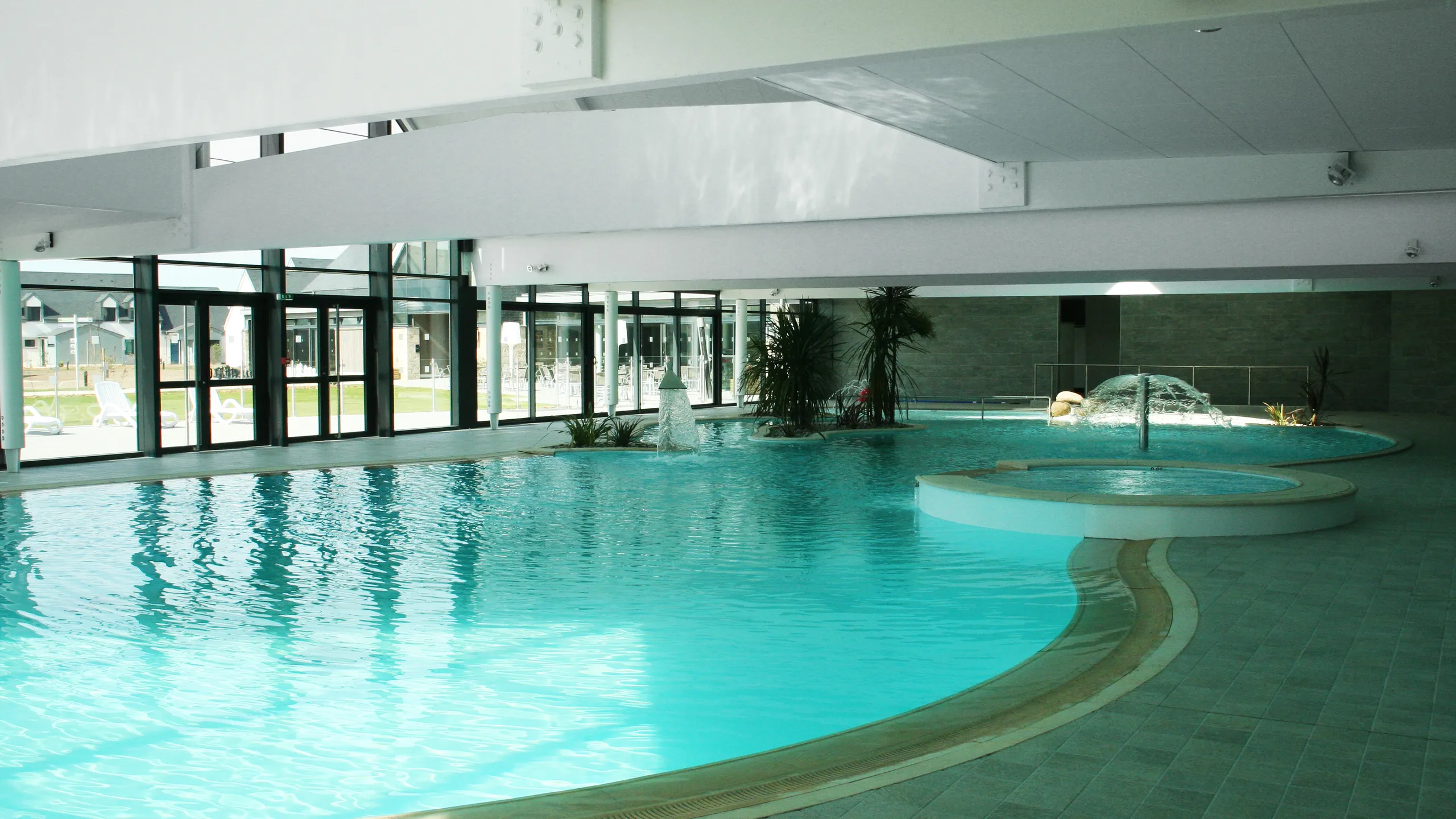 Swimming pool ceiling with white ceiling tiles