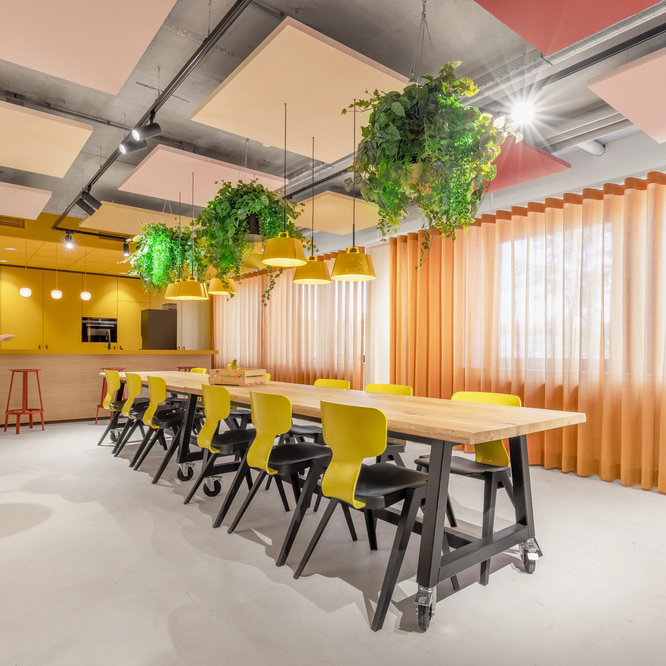 Detail view of Rockfon acoustic floating ceiling panels and suspending ceiling clouds or islands.