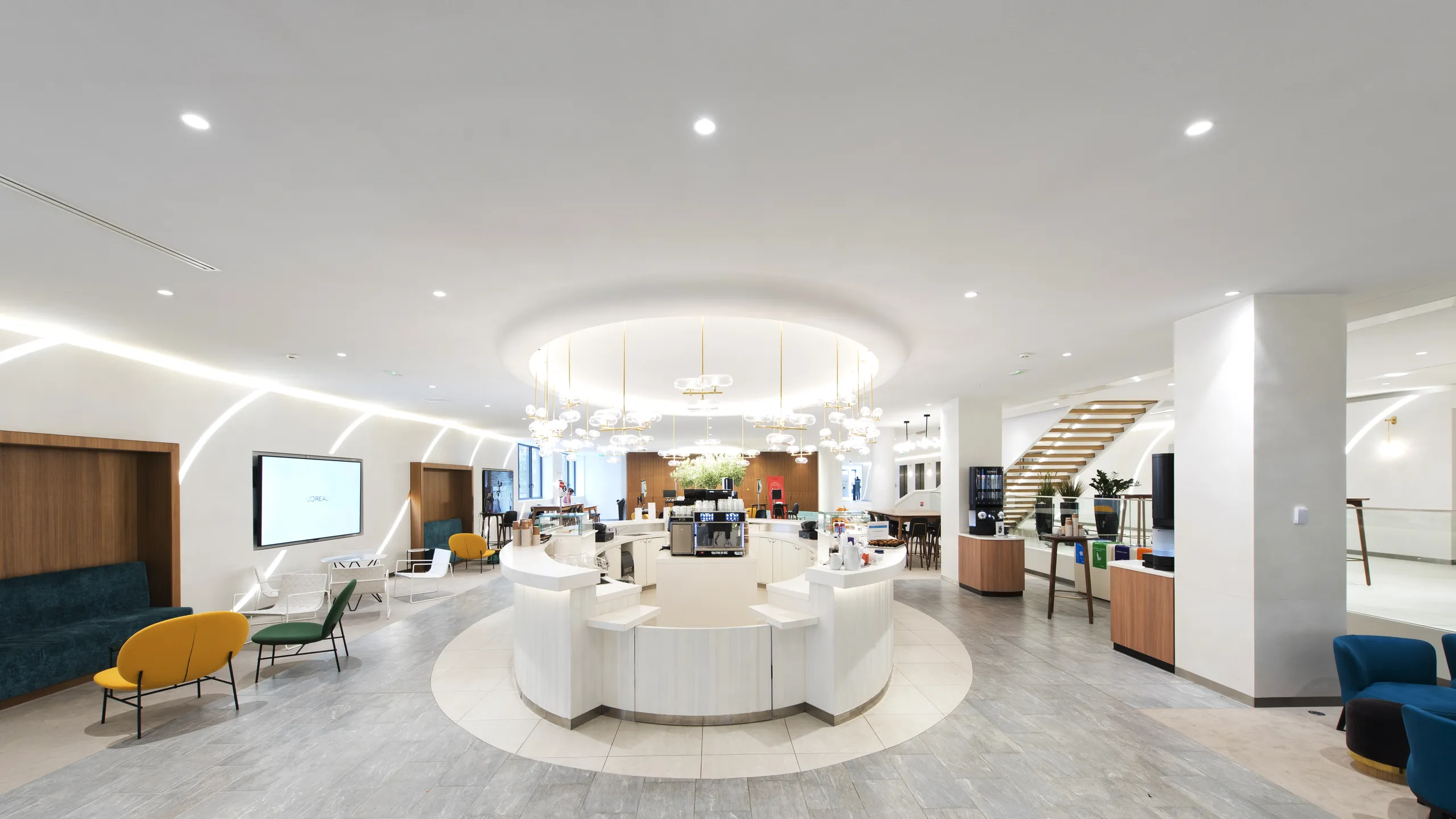 Bright, modern white seamless office ceiling with circular white desk, stylish seating, and contemporary lighting. Neutral tones and sleek design.