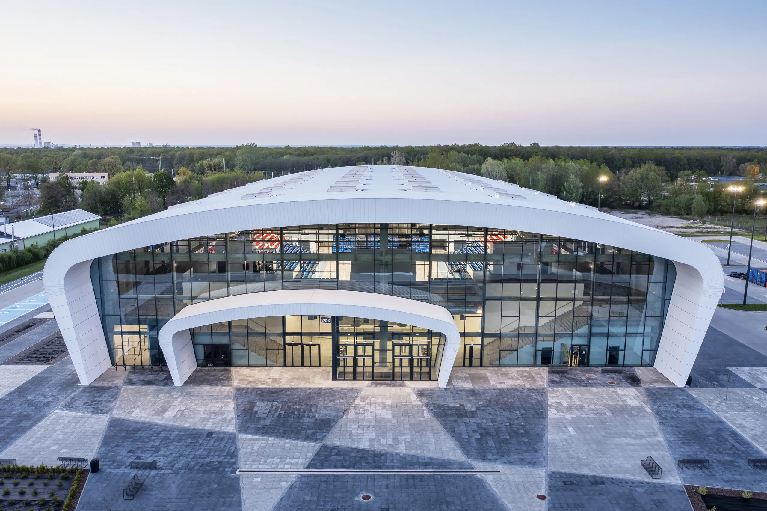 Exterior of MOSiR Entertainment and Sports Hall in Puławy, Poland, designed for high-capacity sports and concert events with modern acoustic solutions