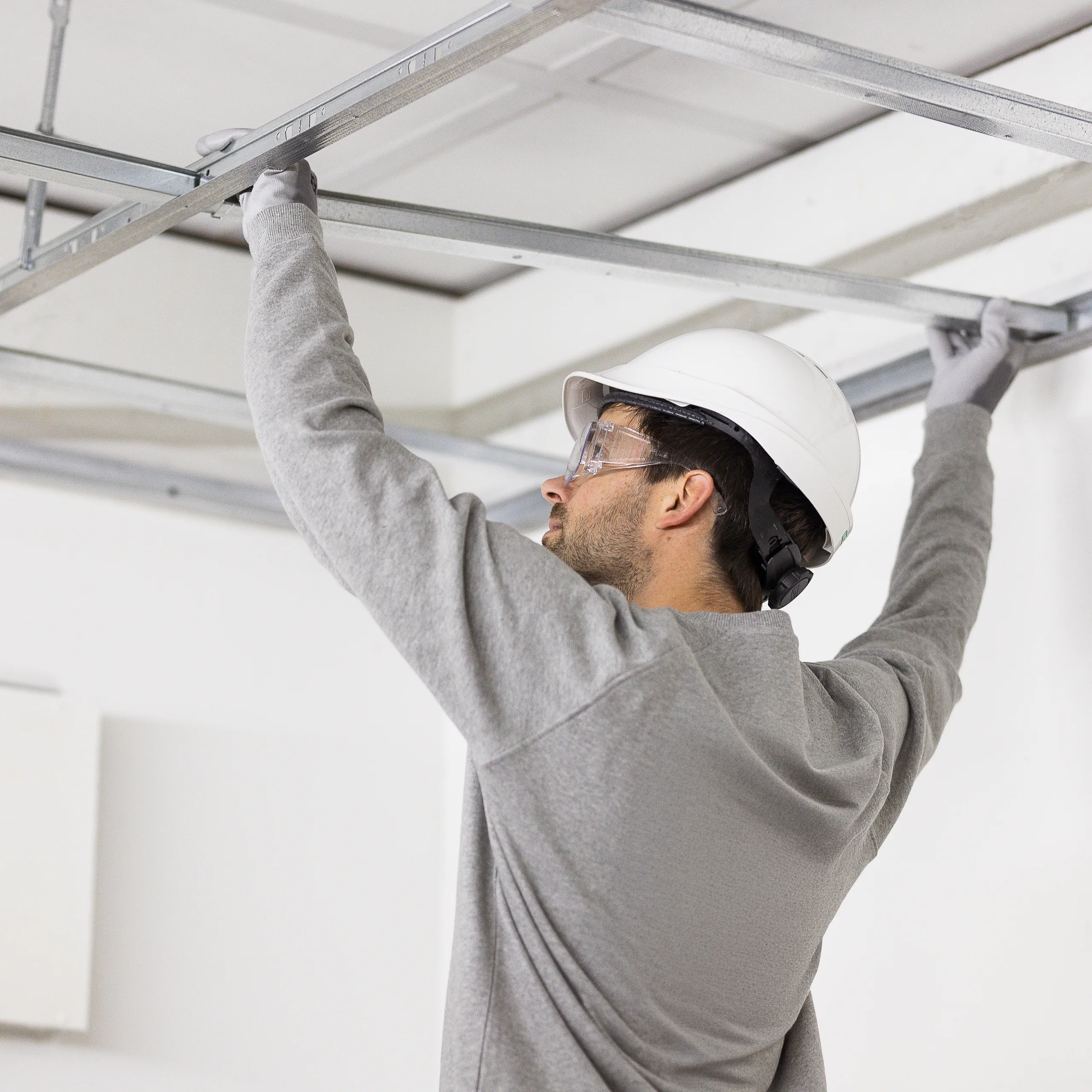 A warehouse storage facility with optimised acoustics using acoustic ceiling solutions.